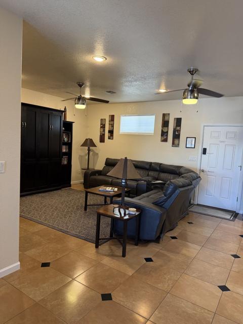 Living room: View of living room from patio doors and dining area.