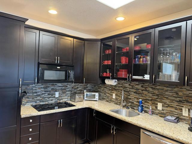 Full kitchen: Plenty of glasses, mugs, dishes, bowls, silverware, pots and pans, toaster oven, toaster, insta-pot, full sized refrigerator with ice maker.