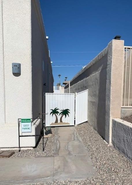 Exterior: Your designated parking spot and private, gated entrance to Casita. Well lighted for your safety and comfort.